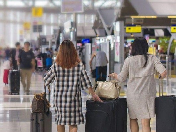 Two females in airport