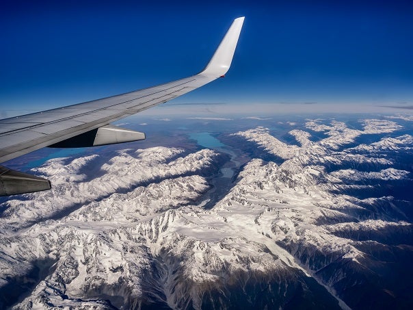 Plane wing over New Zealand