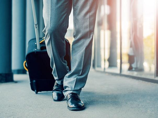 Man travelling with suitcase