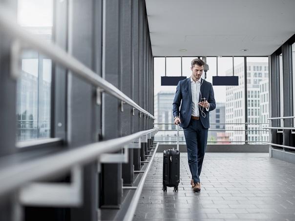 Male with suitcase in airport