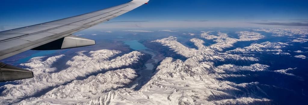 Plane wing over New Zealand