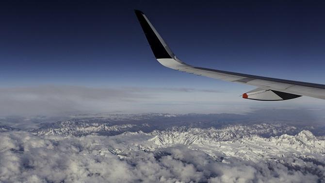 Plane wing over New Zealand