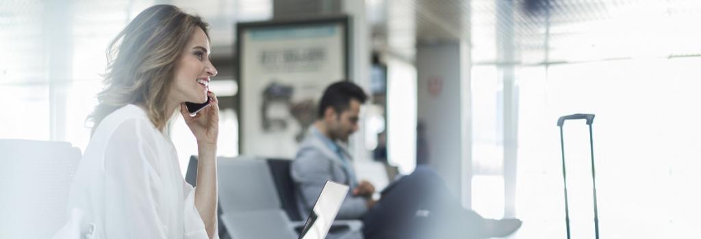 Lady at airport on phone