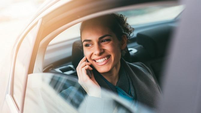 Female on phone in car